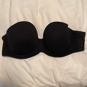 All black smooth, strapless, lightly lined bra
